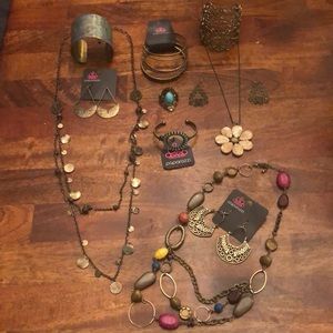 Lot of brass costume jewelry.